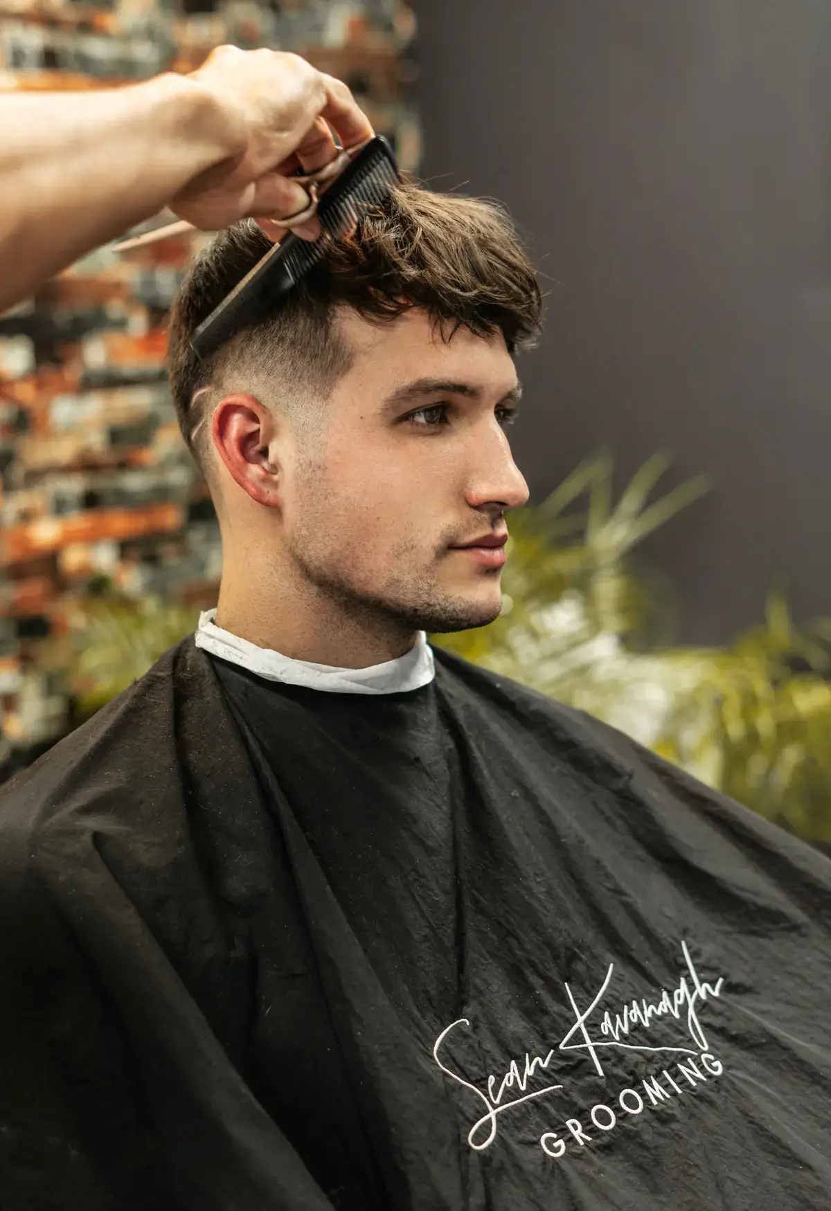 Achieve a smooth transition with our crafted drop bald fade.