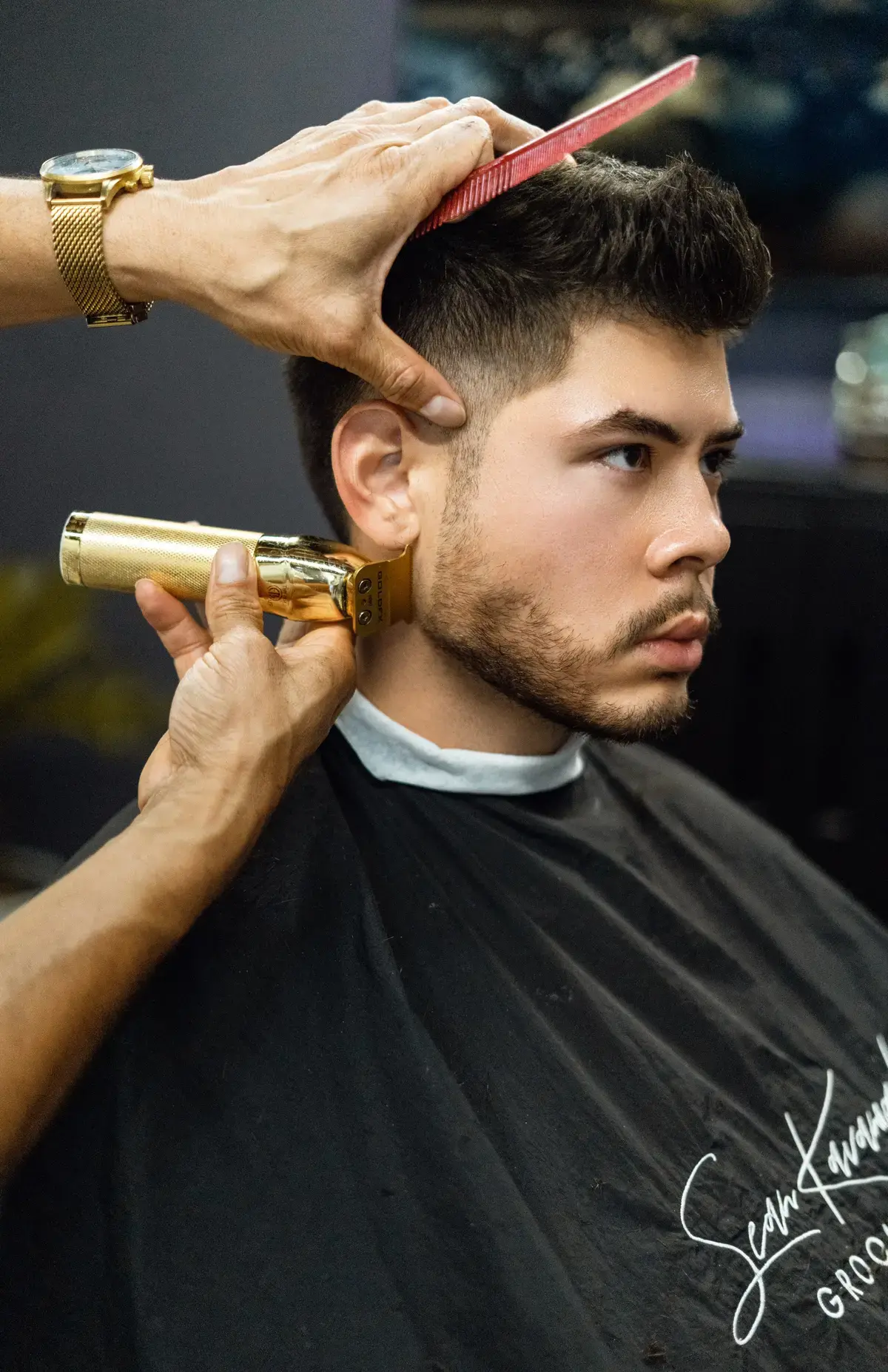 Achieving the perfect blend of style and precision with our classic haircut.